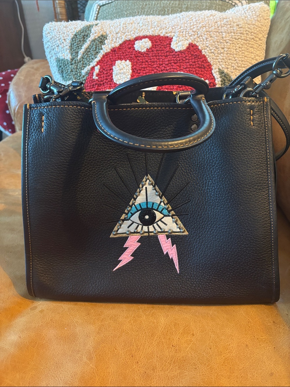 Coach Rogue Evil Eye